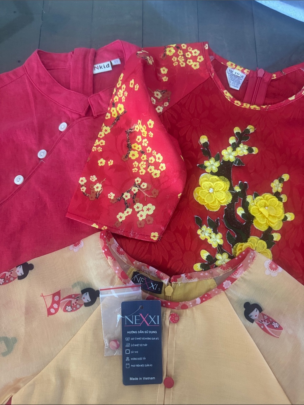 3 Children’s Asian dresses.